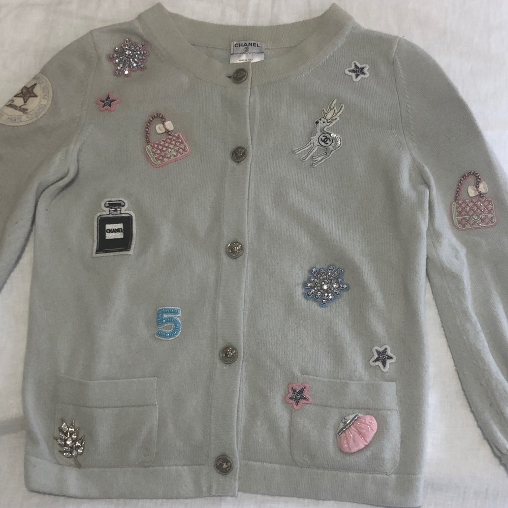 Chanel cardigan with embroidered patches.